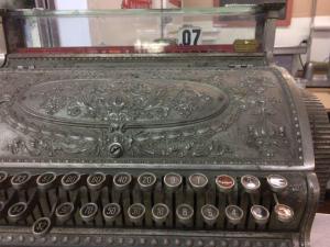 Close view of antique cash register